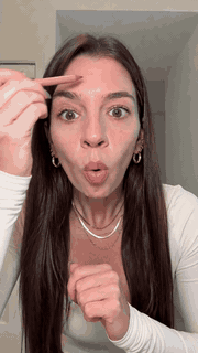AI UGC creator presenting a skincare product